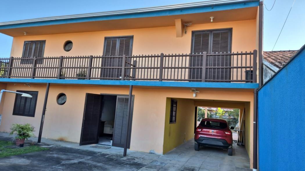 Sobrado em Guaratuba - PR, no bairro Coroados - Referência SO0070-ARBQ